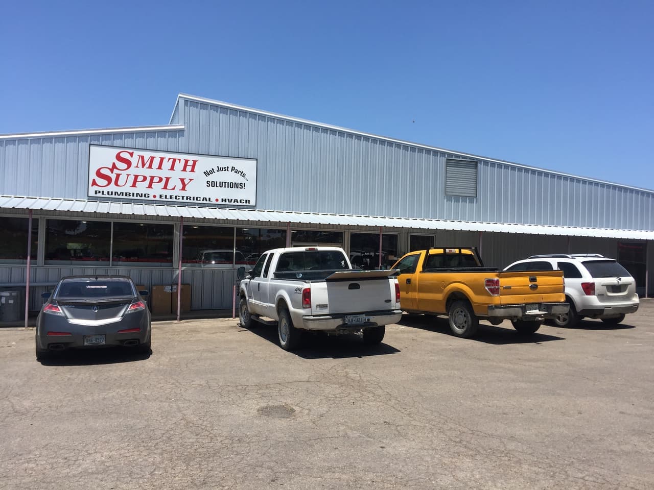 Smith Supply storefront with Plumbing, Electrical and HVACR sign at 1765 W South Loop in Stephenville, TX